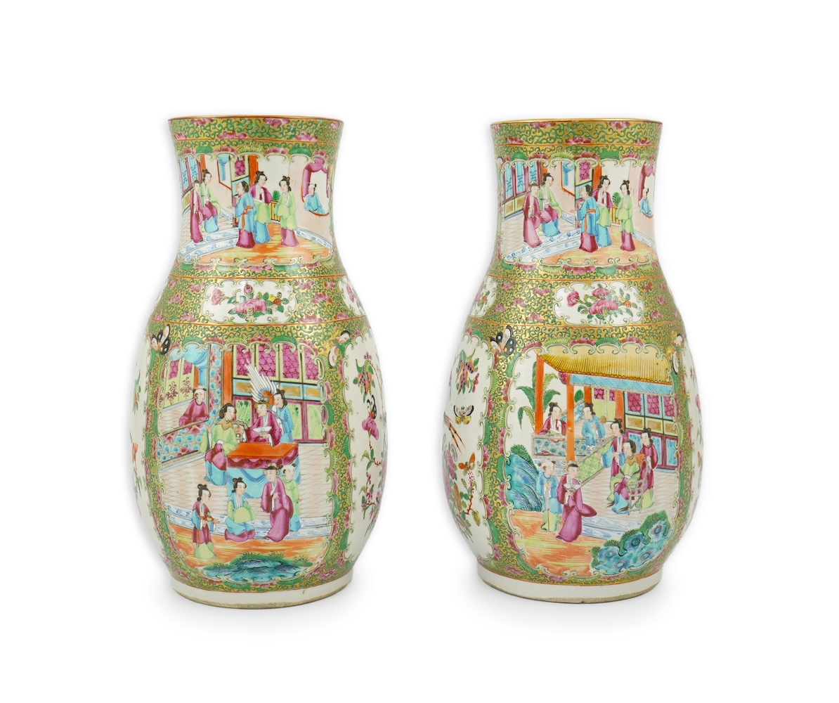 A pair of Chinese famille rose baluster vases, 19th century